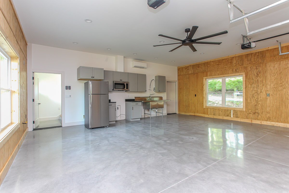 Garage apartment lower level with kitchenette garage apartment with space for two cars and a kitchenette for entertaining